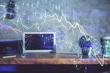 Multi exposure of graph and financial info and work space with computer background. Concept of...