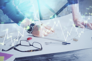 Multi exposure of man standing and planing investment with stock market forex chart.