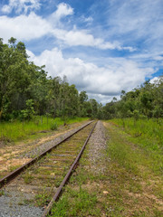 Obraz premium Rusty railway tracks near Kuranda in Tropical North Queensland, Australia