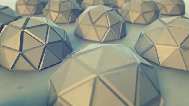 Polygonal metal objects. Abstract futuristic technology or sci-fi concept. 3D render of low poly hemispheres. Seamless loop smooth animation rendered with DOF 4k UHD (3840x2160)