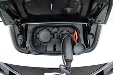 recharging battery of EV car closeup