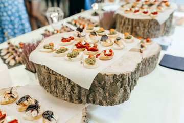 Luxury food and drinks on corporate party table.