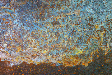 Abstract grunge rustic background. Colorful rusty background. Selective focus