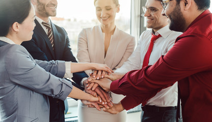 Diversity team of business people in kick-off meeting