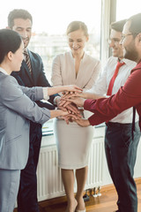 Diversity team of business people in kick-off meeting