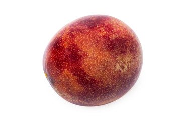 Macro image of single maraquia fruit isolated at white background.