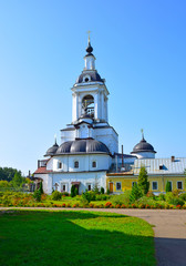 Fototapeta na wymiar Gate St. Nicholas Church with two towers on the sides on the territory of The Avraam monastery was built in 1691 by the masters of Jonah Sysoevich. Russia, Rostov, August 2019