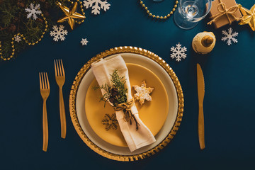 Christmas or New Year table setting.  Place setting for Christmas Dinner. Holiday Decorations.