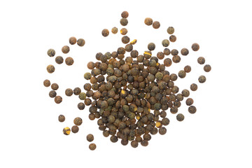 Closeup image of brown lentils pile isolated at white background.