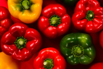 Fresh red, green, yellow bell pepper background.