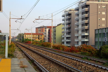 Fototapeta premium Milan, Italy - October 22, 2016: evocative imagine of train rails at the Romolo railway station