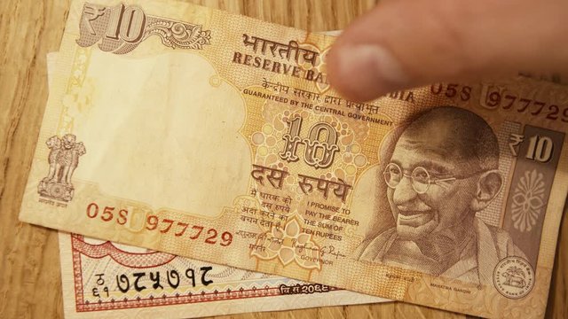 Nepalese and indian rupee multiple denomination notes, close up