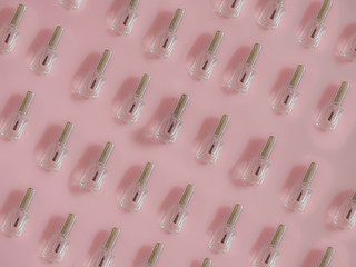 Nails  polish bottle pattern on pink background