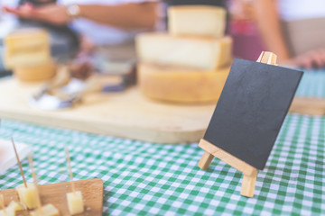 Cheese street market stand with blank board for copy.