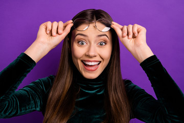 Close up photo of astonished youth touching her eyewear eyeglasses screaming shouting isolated over purple violet background