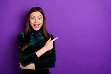 Portrait of astonished millennial screaming shouting wow omg isolated over purple violet background