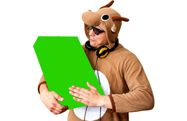 Man in cosplay costume of a cow with green box. Guy in the animal pyjamas sleepwear. Funny photo...