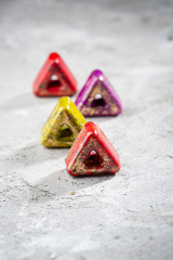 Collection of chocolate candies on gray, food close-up