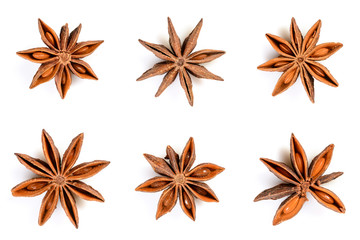 Star anise. Set of six star anise fruits. Closeup Isolated on white background with shadow, top...