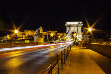 Fototapeta na wymiar mystic Chain Bridge with traffic light trails in Budapest at night