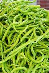 fresh and organic green peppers in market