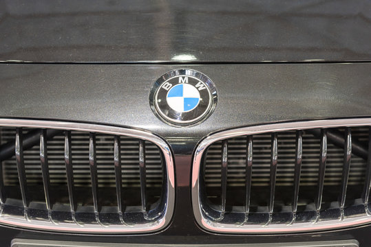 BUCHAREST, ROMANIA - OCTOBER 31, 2014: BMW Sign Close Up. Bayerische Motoren Werke AG commonly known as BMW is a German automobile, motorcycle and engine manufacturing company founded in 1916.
