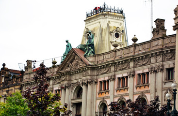 Fototapeta premium Porto, Portugal - August 20th 2015 : Bank of Porto, focus on sculptures.