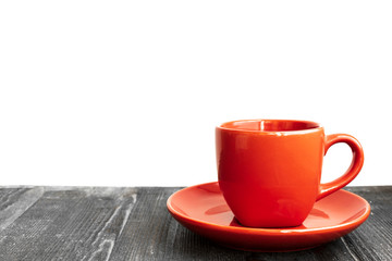 Red coffee cup on wooden desk - coffee mood mockup copy space