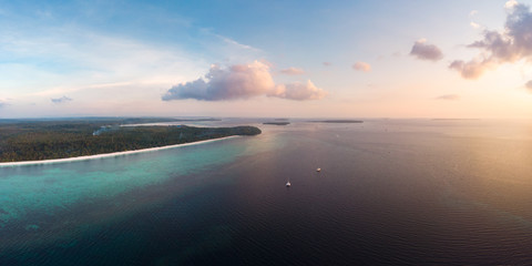 Aerial view tropical beach island reef caribbean sea at sunset. Kei Island, Indonesia Moluccas archipelago. Top travel destination, best diving snorkeling, stunning panorama.