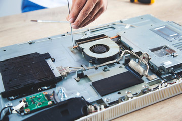 man repair computer