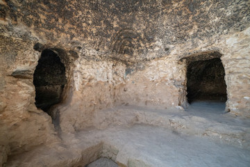 Obraz premium Inside the caves of Takht-e Rostam ancient buddhist stupa-monastery in Samangan, Afghanistan in August 2019