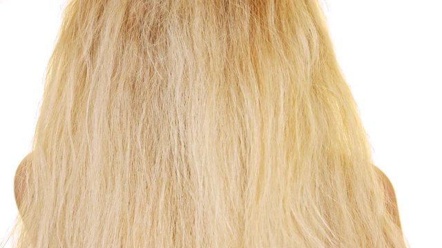 Long blond and healthy hair. Girl moves her hair, Close Up