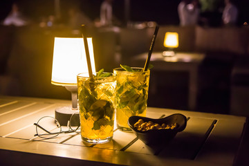 Serving mojito in a street cafe as a summer vacation