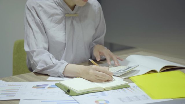 Hands of women who do office work