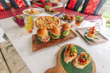 assortment on the table pizza burgers