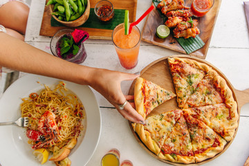 assortment on the table pizza burgers