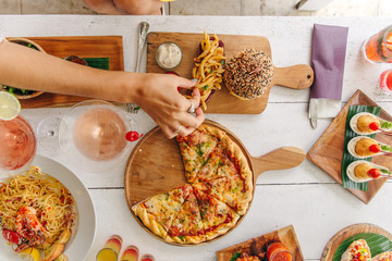 assortment on the table pizza burgers