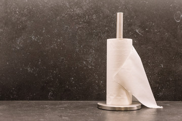 Isolated Paper Towel Roll and a black background