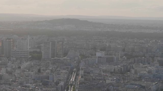 City scenery of Pairs, with Eiffel Tower and skyscrapers in La Defense.