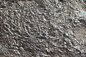Aluminum foil crumples sheet grey background