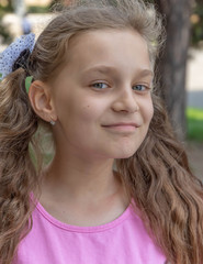 portrait of cute smiling girl outdoor