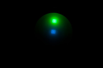 Blue and green LEDs in the dark