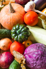 pumpkins, tomatoes, cabbage, zucchini, onions, dry autumn leaves, cucumber, garlic, vegetables