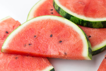 Close-up of fresh slices of red watermelon, top view, summer or food concept