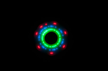 Beautiful pattern formed by a spinning spinner with running LEDs
