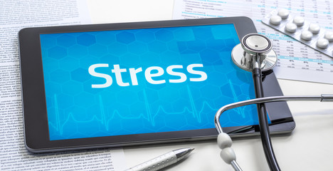 Ein Tablet mit dem Text Stress auf dem Display