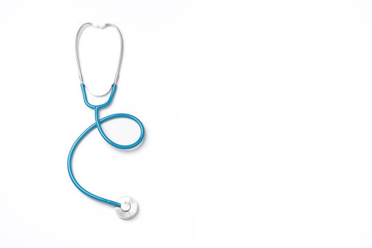 Green stethoscope, object of doctor equipment, isolated on white background. Medical design concept, cut out, clipping path, top view, studio shot.