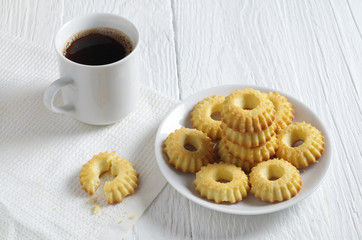 Cookies and coffee in cup