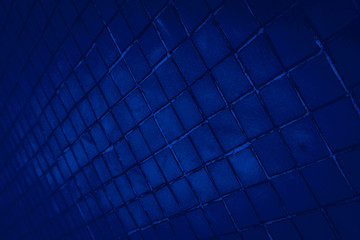 Beautiful closeup textures abstract color dark blue and purple tiles granite and dark blue glass pattern wall and background and art