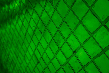 Beautiful closeup textures abstract color dark black white and light green tiles granite and light green glass pattern wall and background and art